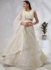 Adorned with Sequins Embroidery Classic Cream Net Lehenga Choli